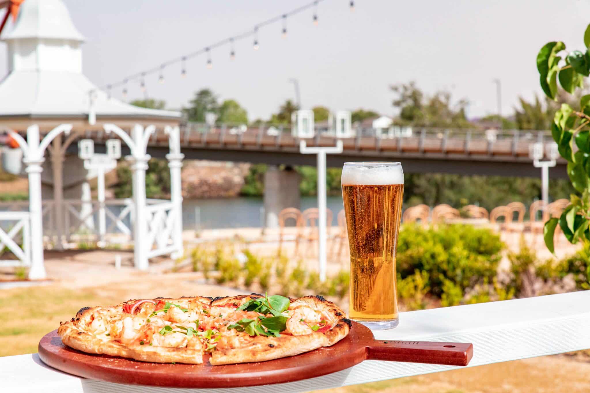 Pizza and Beer by Scenic Water